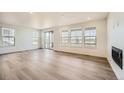 Bright living room featuring wood floors, recessed lighting, and large windows with picturesque views at 2924 S Poppy St, Morrison, CO 80465