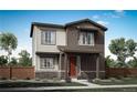 Two-story house with brown siding, red door, and stone accents at 5772 N Jebel Way, Aurora, CO 80019