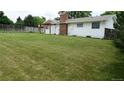 Large, grassy backyard, perfect for outdoor activities and relaxation at 8895 E Radcliff E Ave, Denver, CO 80237