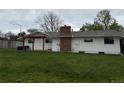 Spacious backyard with lush green grass, perfect for outdoor activities and relaxation at 8895 E Radcliff E Ave, Denver, CO 80237