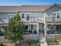 This townhome features a private patio perfect for relaxation or entertaining, and outdoor stair to the second floor at 11250 Florence St # 17D, Commerce City, CO 80640