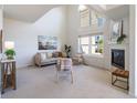Bright living room with vaulted ceilings, a fireplace, and comfortable seating at 211 Rockview Dr, Superior, CO 80027