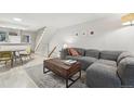 Cozy living room with comfortable seating and bright neutral color palette at 1198 Milo Cir # A, Lafayette, CO 80026