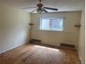 Bedroom features a ceiling fan and a window that allows natural light to illuminate the space at 14602 E 2Nd Ave # 108-C, Aurora, CO 80011