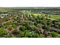 Overhead view showcases the community, mature landscaping, and amenities of Cherry Creek Country Club and Highline Canal Trail at 9400 E Iliff Ave # 292, Denver, CO 80231