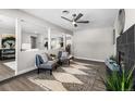 Cozy sitting area with fireplace and modern decor at 914 Quari Ct, Aurora, CO 80011