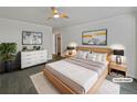 Virtually staged main bedroom with a light wood bed frame at 7770 W 90Th Dr, Broomfield, CO 80021