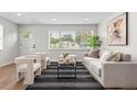 Inviting living room with modern furnishings, lots of natural light and a welcoming atmosphere at 742 Hanover St, Aurora, CO 80010