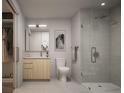 Modern bathroom with sleek glass shower, vanity, and linen closet at 525 18Th St # 1702, Denver, CO 80202