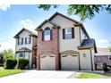 Lovely two-story home with a well-maintained lawn, driveway, and a two-car garage at 11951 Singing Winds St, Parker, CO 80138