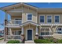 Inviting condo with private balcony and covered entryway at 9387 Ashbury Cir # 203, Parker, CO 80134