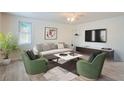Inviting living room featuring modern decor and comfortable seating arrangements at 2332 W Baltic Pl, Englewood, CO 80110