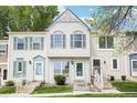 Attractive townhome with well-kept lawn and decorative trim at 6722 S Independence St, Littleton, CO 80128