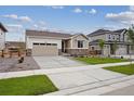 Beautiful one-story home with well-maintained landscaping, and a two-car garage and long driveway at 24780 E 39Th Ave, Aurora, CO 80019