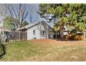 Expansive backyard featuring a well-maintained lawn and a wooden fence at 309 S Hudson St, Denver, CO 80246