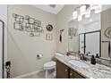 Bathroom features neutral walls, granite vanity and walk-in shower at 23539 E Ida Dr # C, Aurora, CO 80016