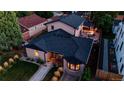 Aerial view of the house, showcasing its neat landscaping and neighborhood setting at 3812 W 24Th Ave, Denver, CO 80211
