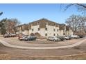 Apartment building exterior, ample parking, landscaping at 5995 E Iliff Ave # 120, Denver, CO 80222