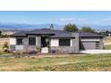 Stunning ranch home with mountain views and a landscaped yard at 2730 Fox View Trl, Franktown, CO 80116