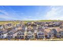 A beautiful aerial view of a well-planned neighborhood with green spaces and modern homes at 175 Westerly Blvd, Erie, CO 80516