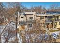 Modern two-story home with stone accents and a private balcony at 3323 W Hayward Pl, Denver, CO 80211