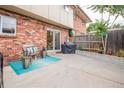 Brick patio with seating area and grill at 12644 W Virginia Ave, Lakewood, CO 80228