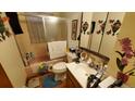 Modest bathroom with a shower-tub combination, vanity, and standard fixtures at 8338 Charles Way, Denver, CO 80221
