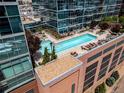 Aerial view of rooftop pool offering an outdoor oasis in the city at 1700 Bassett St # 1119, Denver, CO 80202