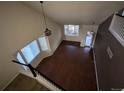 Living room with hardwood floors and a view of the entryway at 17 Ellendale St, Castle Rock, CO 80104