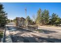Inviting entrance to Brookmoor Estates showcases well-maintained landscaping and signage at 1660 Moveen Hts, Monument, CO 80132