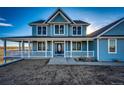 Charming two-story home with a covered porch and great curb appeal at 52900 E 88Th Ave, Strasburg, CO 80136