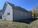 Exterior view of a home featuring new siding and a skylight, promising natural light indoors at 660 Hickory St, Hudson, CO 80642