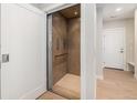 Interior image of an elevator with wood paneling and wooden floors at 2321 Lakeshore Ln # 10, Superior, CO 80027