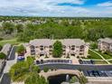 Scenic aerial view of condo building, showcasing its location within a lush, green neighborhood at 10787 Twenty Mile Rd # 205, Parker, CO 80134