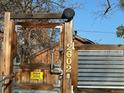 Wooden gate with metal accents and house number 2602 at 2602 Jasmine St, Denver, CO 80207