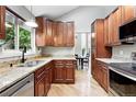 Well-equipped kitchen features granite countertops and stainless steel appliances at 6248 E Mineral Pl, Centennial, CO 80112