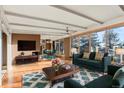 Bright living room featuring a large picture windows, modern furniture and stylish decor at 428 N Perry Park Rd, Sedalia, CO 80135