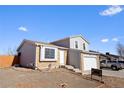 Charming two-story home featuring low maintenance landscaping at 4343 E 93Rd Pl, Thornton, CO 80229