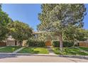 Inviting home with a manicured lawn, complemented by mature trees and steps to the front door at 2896 W 119Th Ave, Westminster, CO 80234