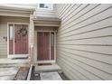 Exterior view of a home's front entrance and door, showing the welcome mat at 3529 S Telluride Cir # D, Aurora, CO 80013