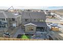 Two-story house with backyard patio, aerial view at 1781 Chestnut Ave, Erie, CO 80516