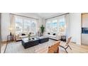 Spacious living room with two sofas and a coffee table at 1781 Chestnut Ave, Erie, CO 80516