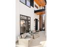Inviting outdoor seating area with comfortable wicker chairs, perfect for relaxation at 99 S Albion St, Denver, CO 80246