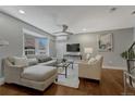 Bright and airy living room with large windows and comfortable seating at 1355 Gaylord St # 6, Denver, CO 80206