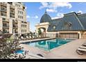 Enjoy this relaxing pool area, perfect for unwinding with lounge chairs and a tranquil atmosphere at 975 N Lincoln St # 3H, Denver, CO 80203