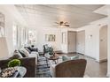 Bright living room with hardwood floors, neutral decor, and ample natural light at 4445 Milwaukee St, Denver, CO 80216