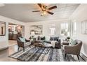 Cozy living room featuring stylish decor, comfortable seating, and a warm, inviting ambiance at 4445 Milwaukee St, Denver, CO 80216