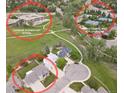 Stunning aerial view showcasing the property's proximity to a school, tennis courts, pool and playground at 1825 Keota Ln, Superior, CO 80027