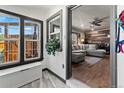 Inviting entryway with natural light and view of the stylish living room at 1390 Emporia St, Aurora, CO 80010