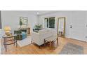 Bright living room featuring hardwood floors and contemporary furniture at 4650 S Idalia St, Aurora, CO 80015